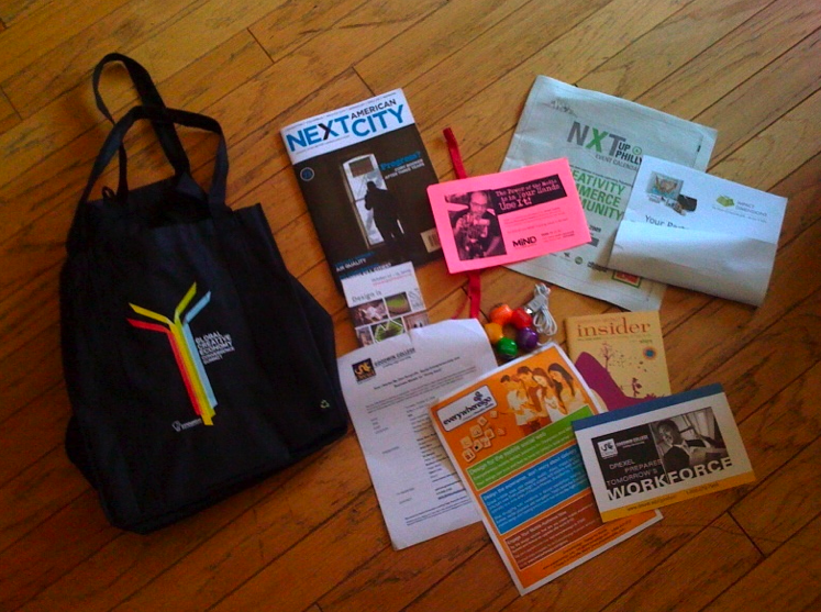The GCECS goodie bag: Many fliers and booklets. One Comcast-branded USB hub.