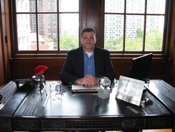 Mike Zammuto, president of Brand.com, in his new Washington Square office.