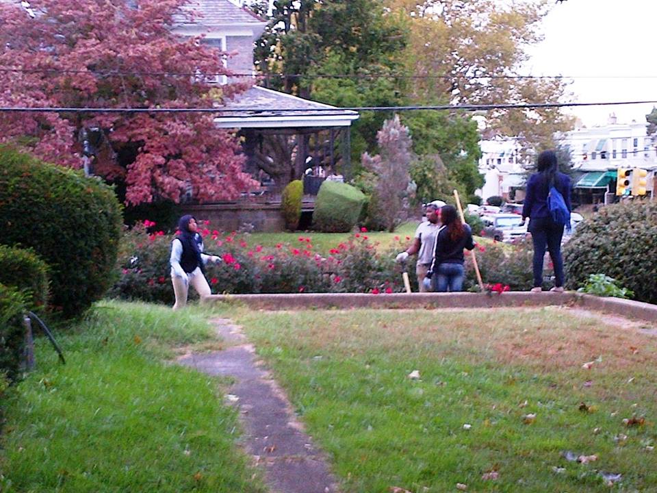 Community members participate in a PhillyRising fall cleanup in the Haddington neighborhood of West Philly. 