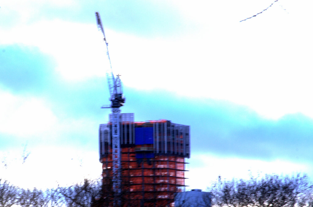Cranes rise over Brooklyn last Winter, from Fort Greene.