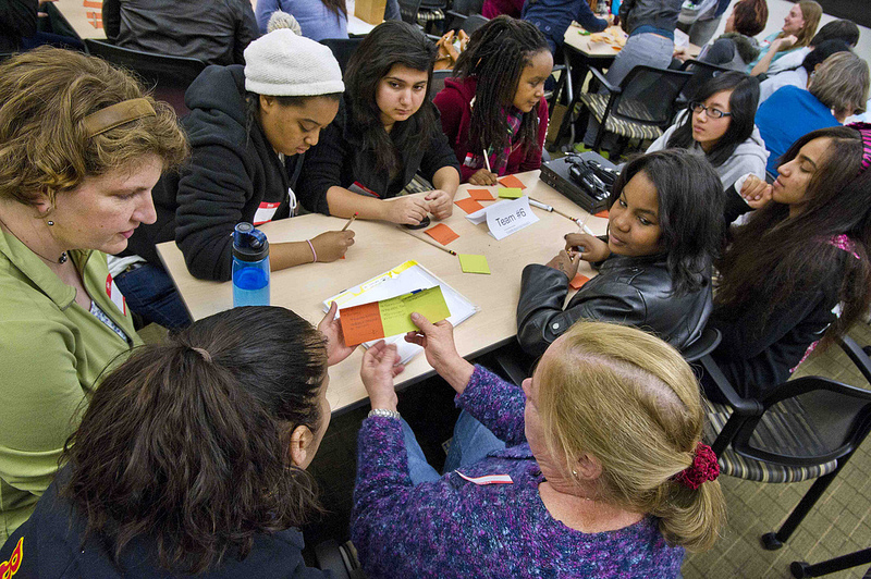 Women researchers at the Berkeley Lab mentor a Technovation Challenge team of high school students in 2012.