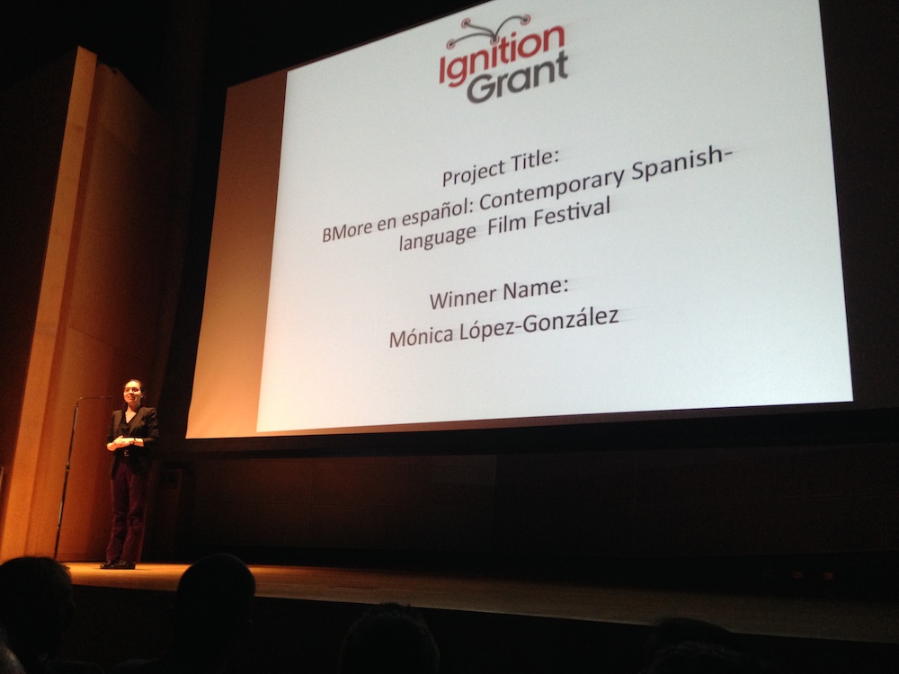 Monica Lopez-Gonzalez receiving the Ignition Grant at Ignite Baltimore #15.
