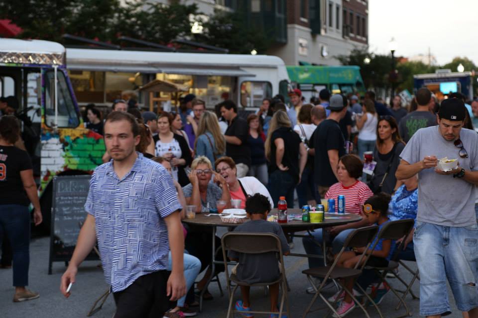 Attendees of the Baltimore Innovation Week 2014 kickoff party (with the Gathering food truck coalition at McHenry Row).