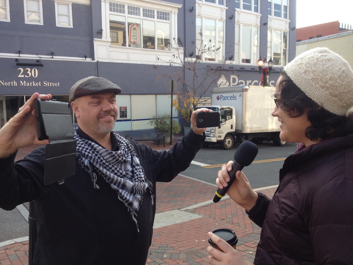 Ken Grant filming an interview in Wilmington.