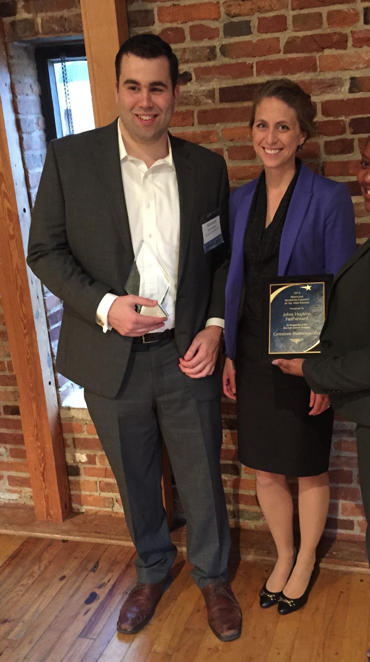 Gemstone’s Matthew Davenport and Laura Dickinson accept an Incubator Company of the Year award.