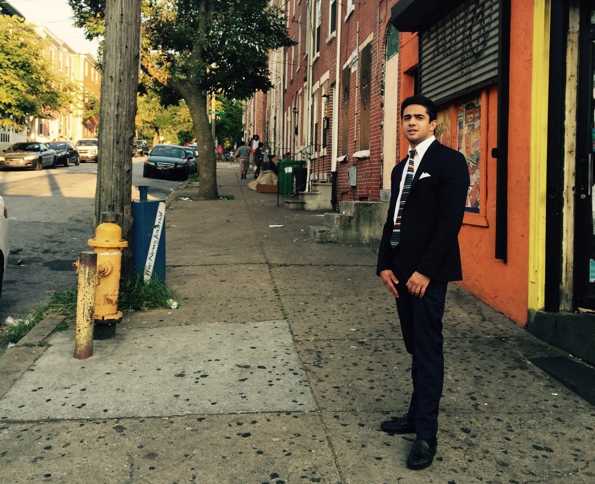 Mac Nagaswami in front of his Adams Street home.