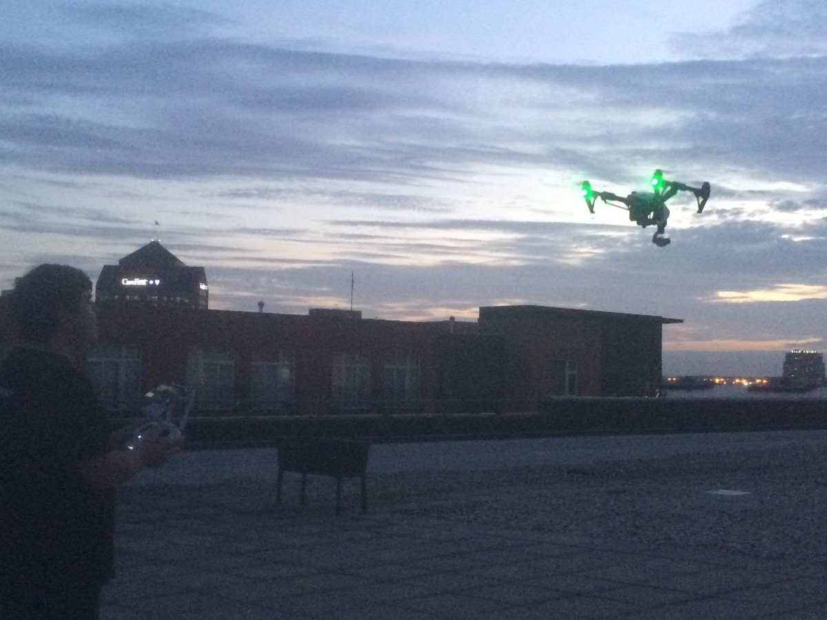 A UAV hovers above the #BIW15 drone showcase.