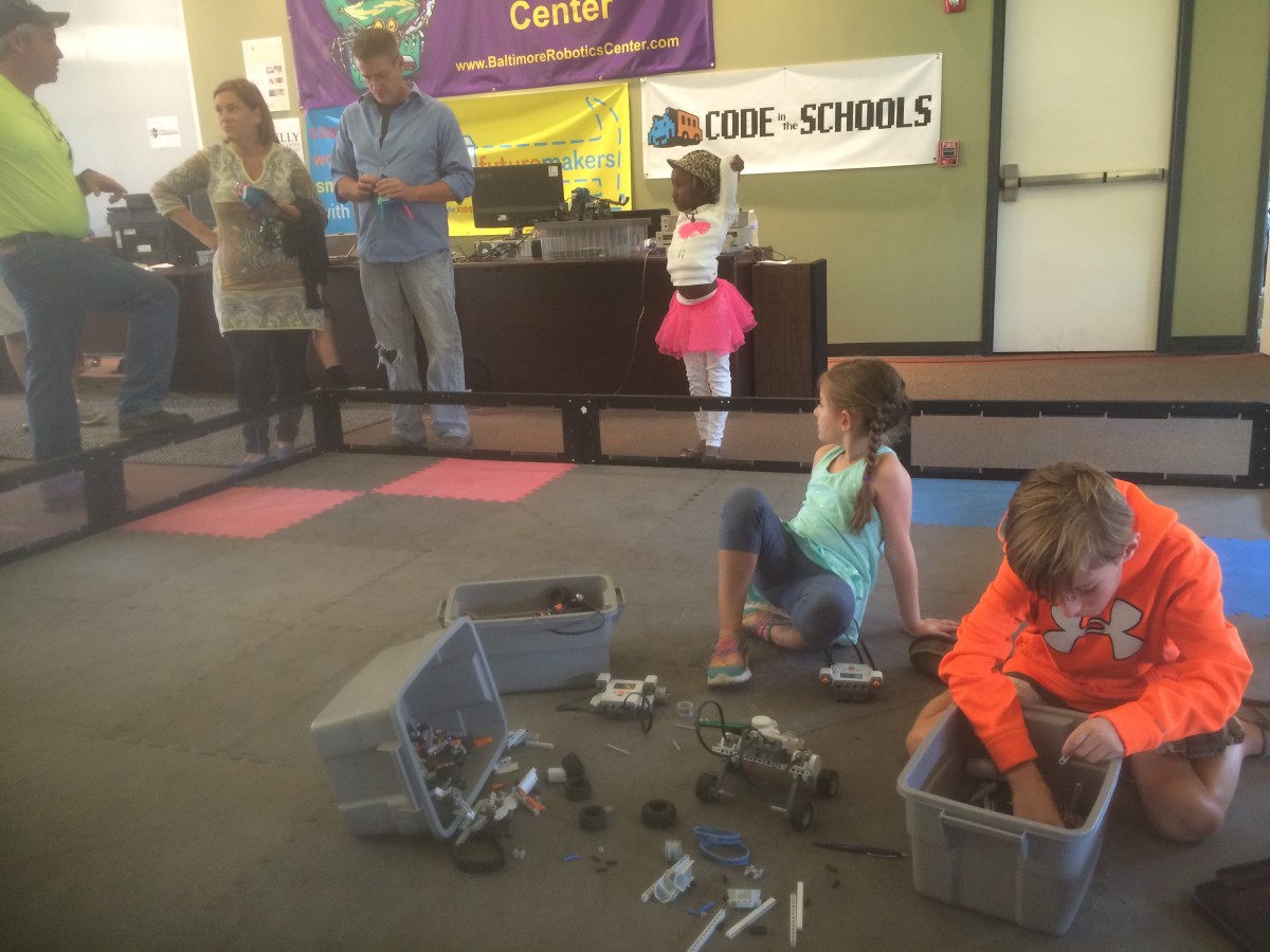 Attendees of Robopalooza get hands-on with robots.