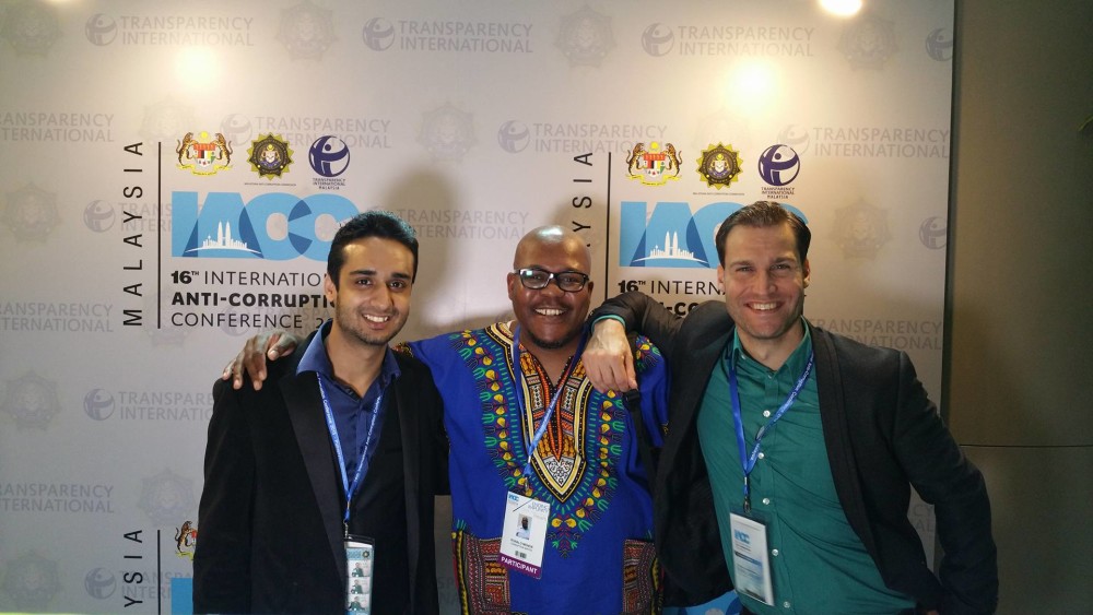 Arad Malhotra (left) at the International Anti-Corruption Conference, where he was a speaker.
