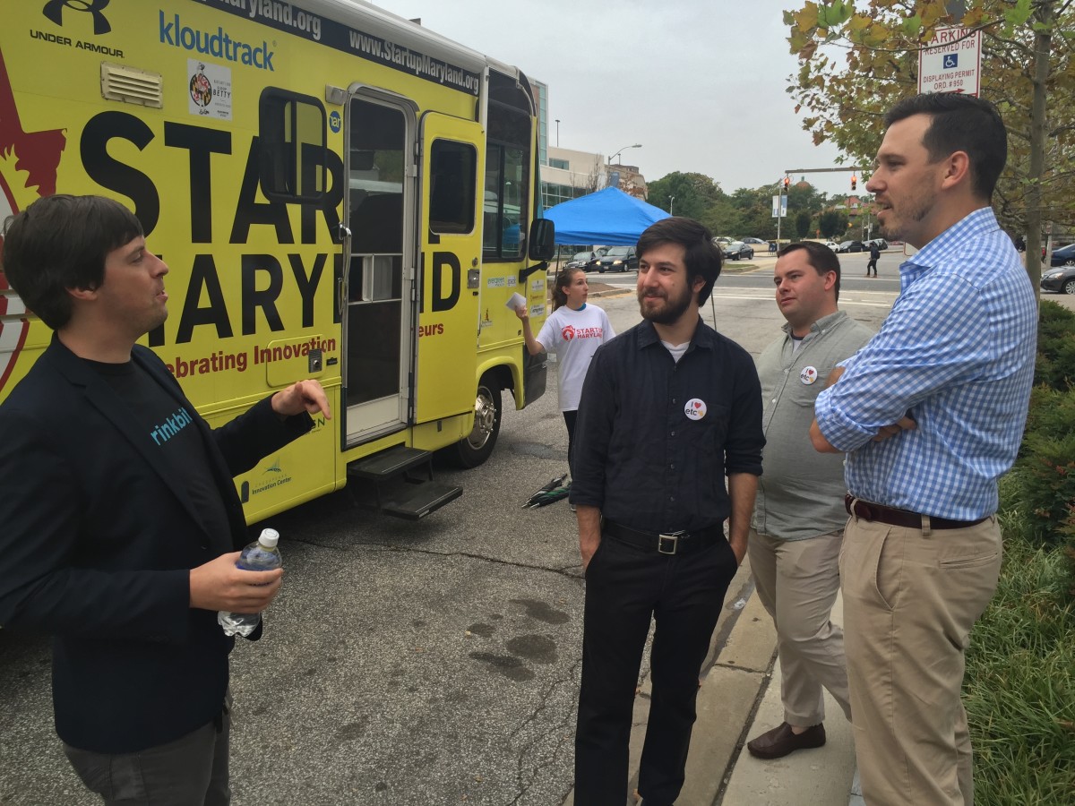 Brinkbit and Visable founders outside the Startup Maryland bus at UB in 2015.