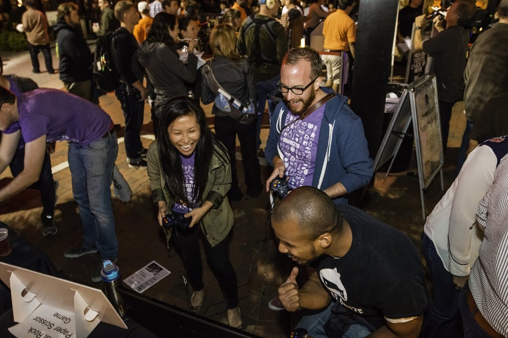 Playing video games as part of the #BIW15 Kickoff Festival with the Gathering at Power Plant Live!
