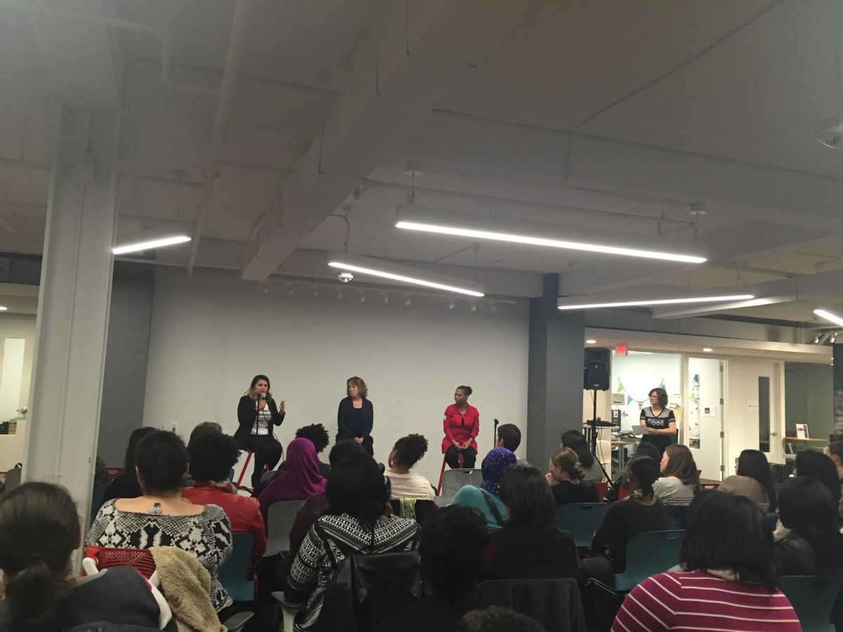 The panel speaks to the crowd gathered at the Women Who Code DC Mentoring Program launch. 