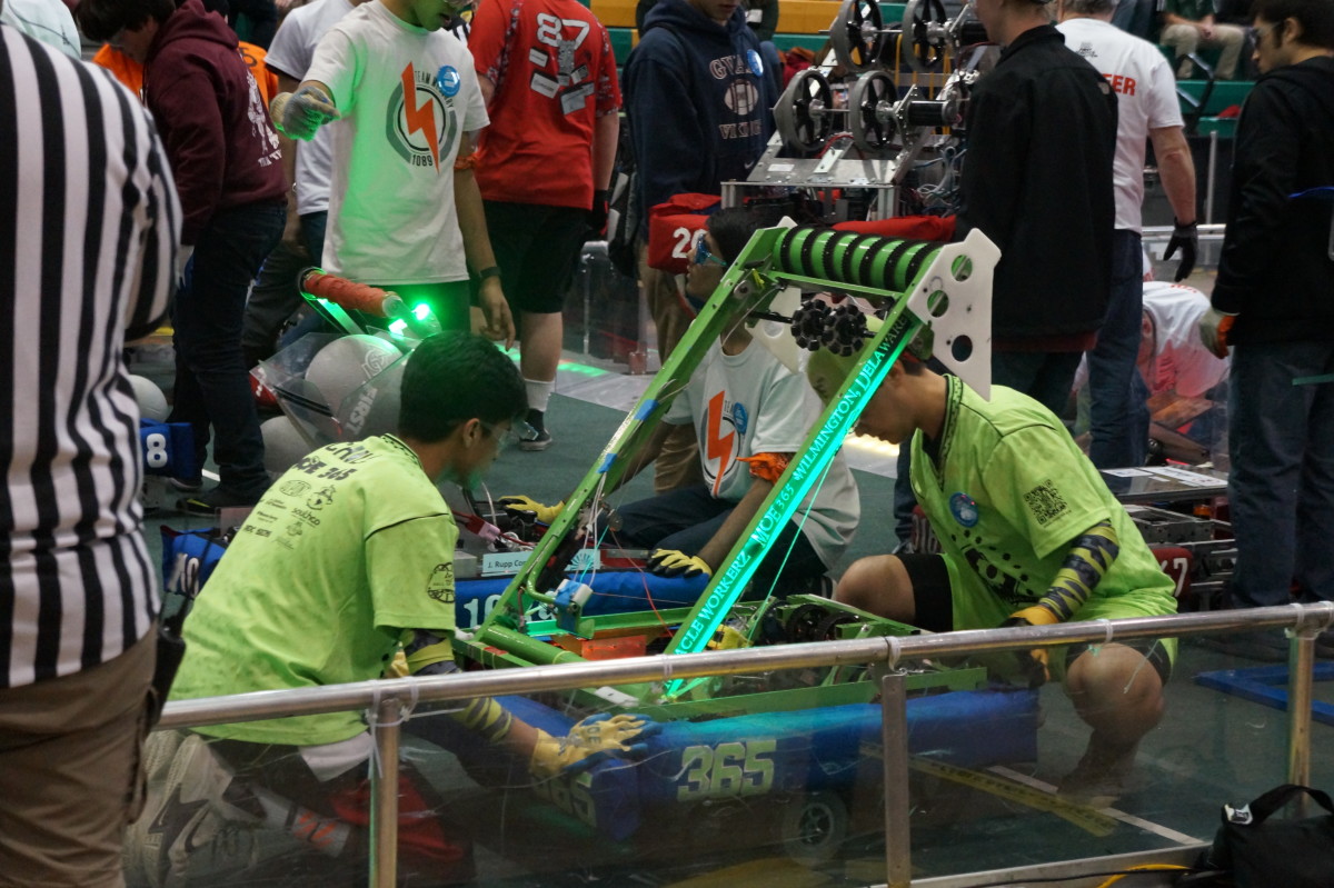 The Miracle Workerz prep their robot.