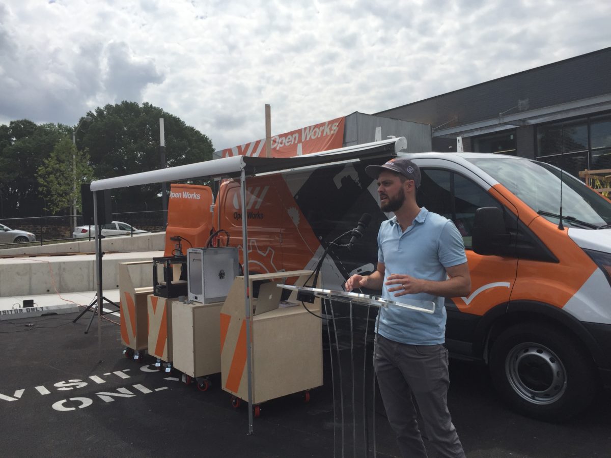 Open Works General Manager Will Holman in front of the makerspace-in-a-van.