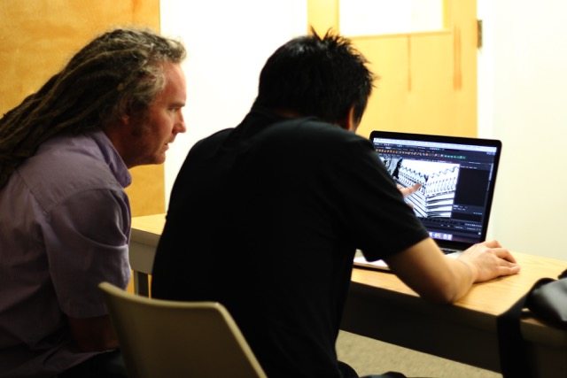 Scott Shaw helps one of his students at Wilmington University. (Courtesy photo)
