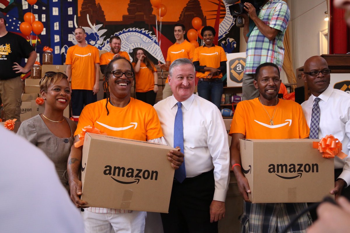 Mayor Kenney accepting Amazon’s donation.
