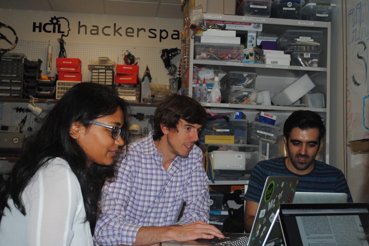 From right to left: Saha, Froehlich and Behnezhad are hard at work. (Photo by Aysha Khan)