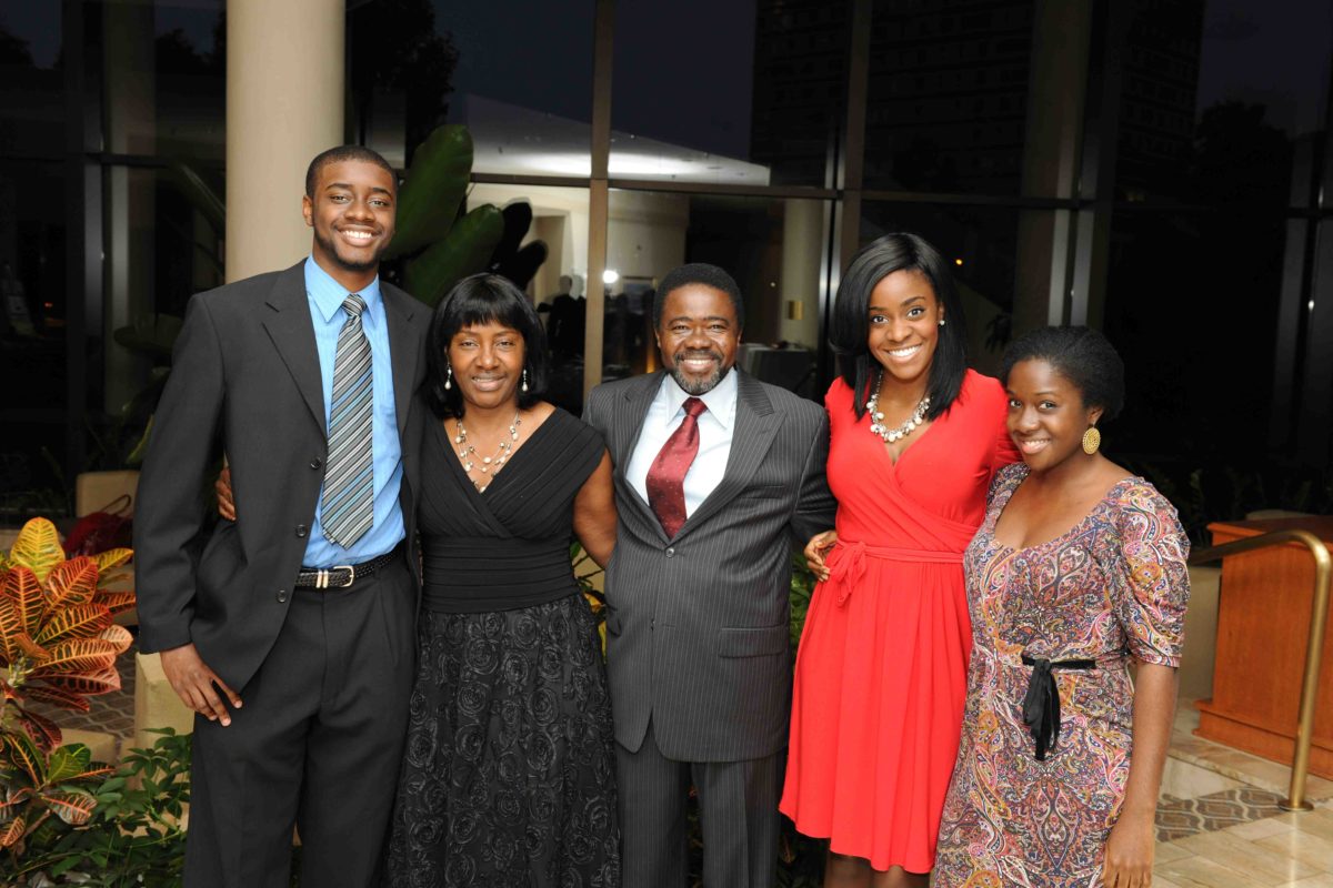 Janice Omadeke (in red) and her family.