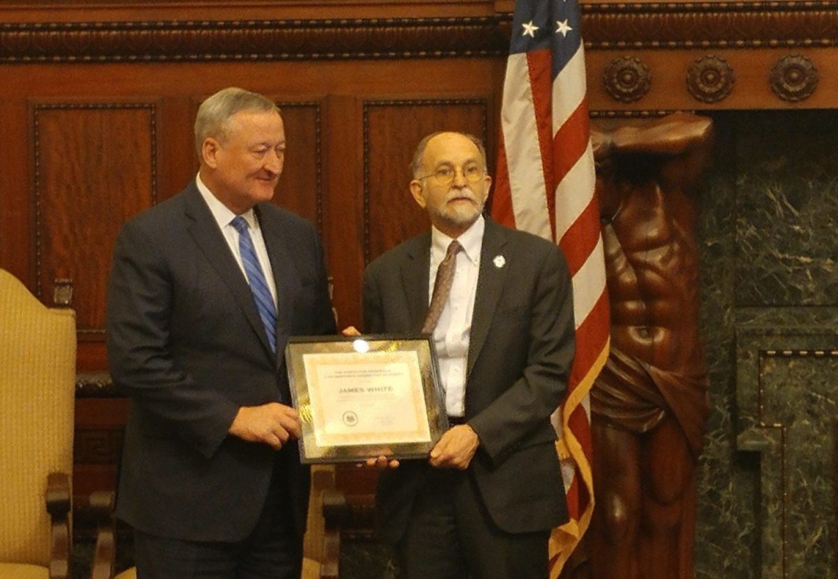 Deputy CIO Jim White receives the  Inspector General’s Joan Markman Award from Philadelphia Mayor Jim Kenney.