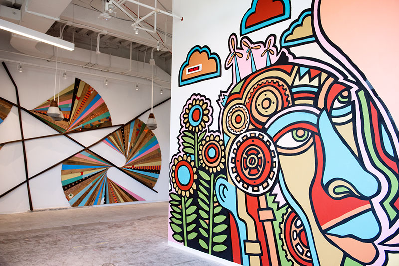 Art installations crafted by local artists and designers at Etsy HQ, including First Third and Misha Tyutyunik.