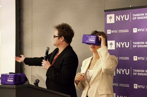 NYU's Mark Skwarek guides Deputy Mayor Alicia Glen in testing out a VR app. (Courtesy photo)