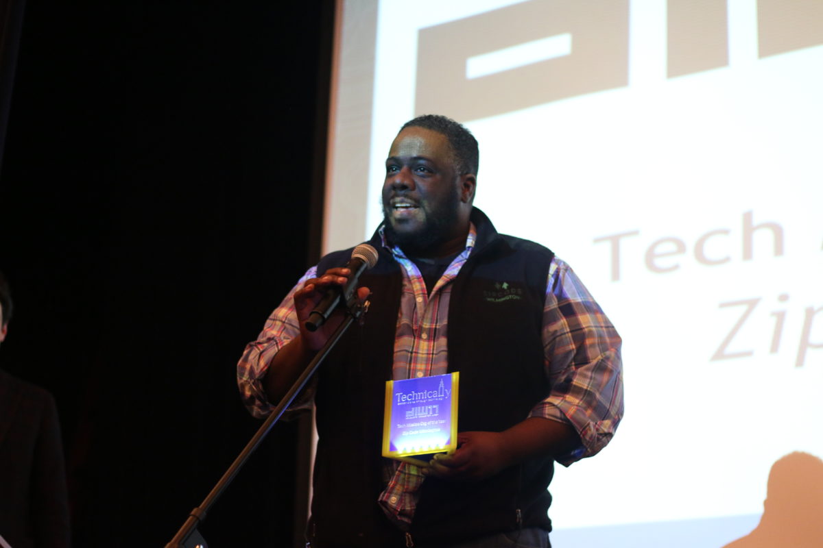Tariq Hook of Zip Code Wilmington accepts the coding school's 2017 Delaware Innovation Award. (Photo by Dominique Nichole)