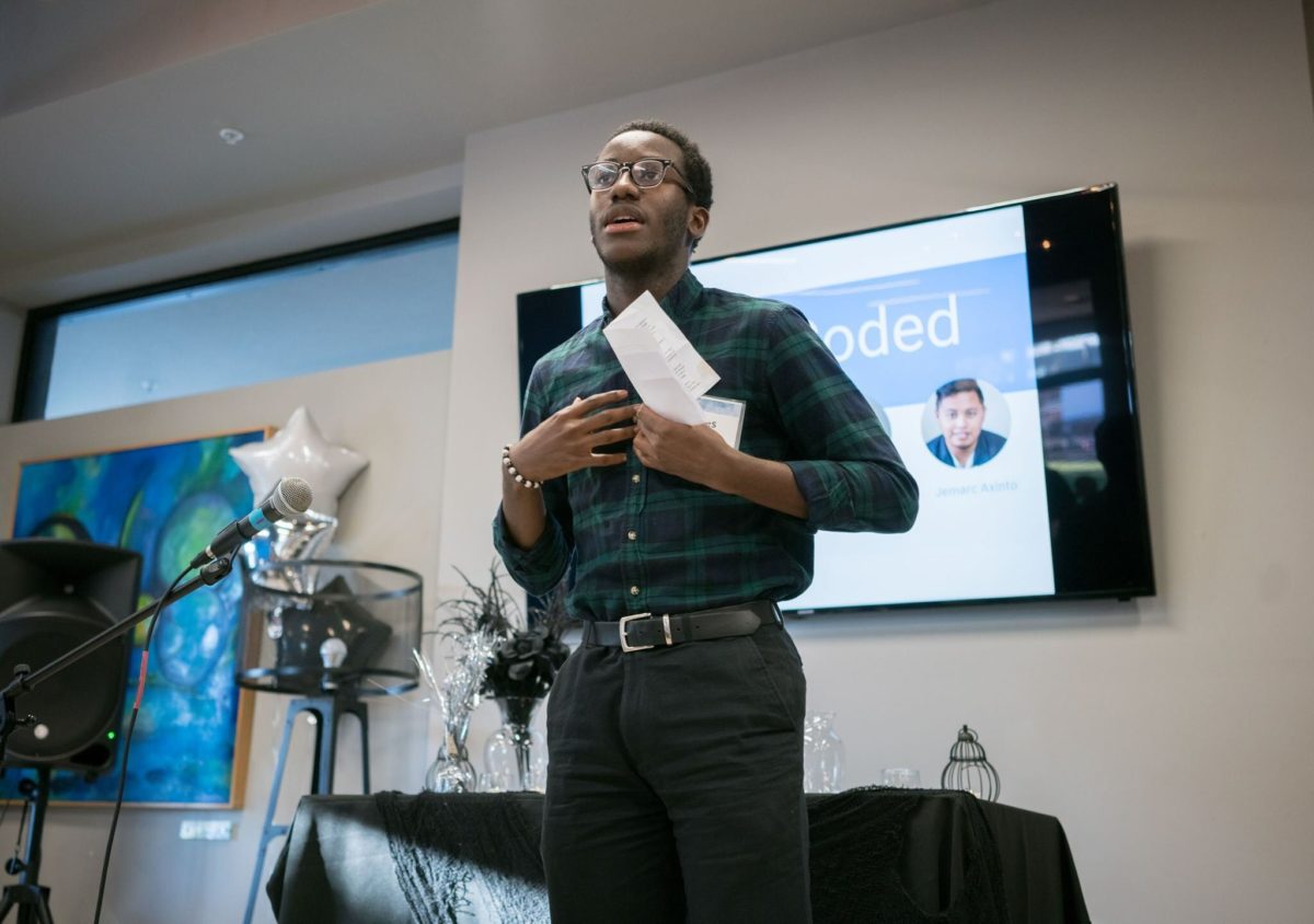 James Massaquoi presents during a pitch competition at UD's Horn Program in Entrepreneurship.