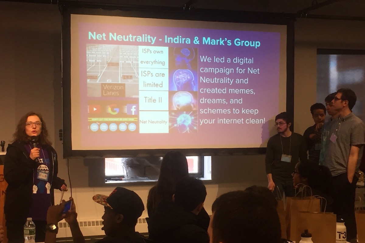 Volunteer Indira Ardolic presenting her group’s net neutrality digital campaigns. (Photo by Ellen Cranley)