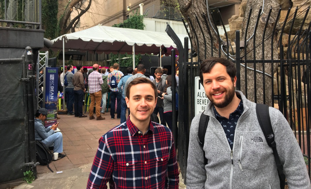 Ryan Foutty of ofo and Ryan Croft of Transitscreen with the #WeDC tent behind them. 