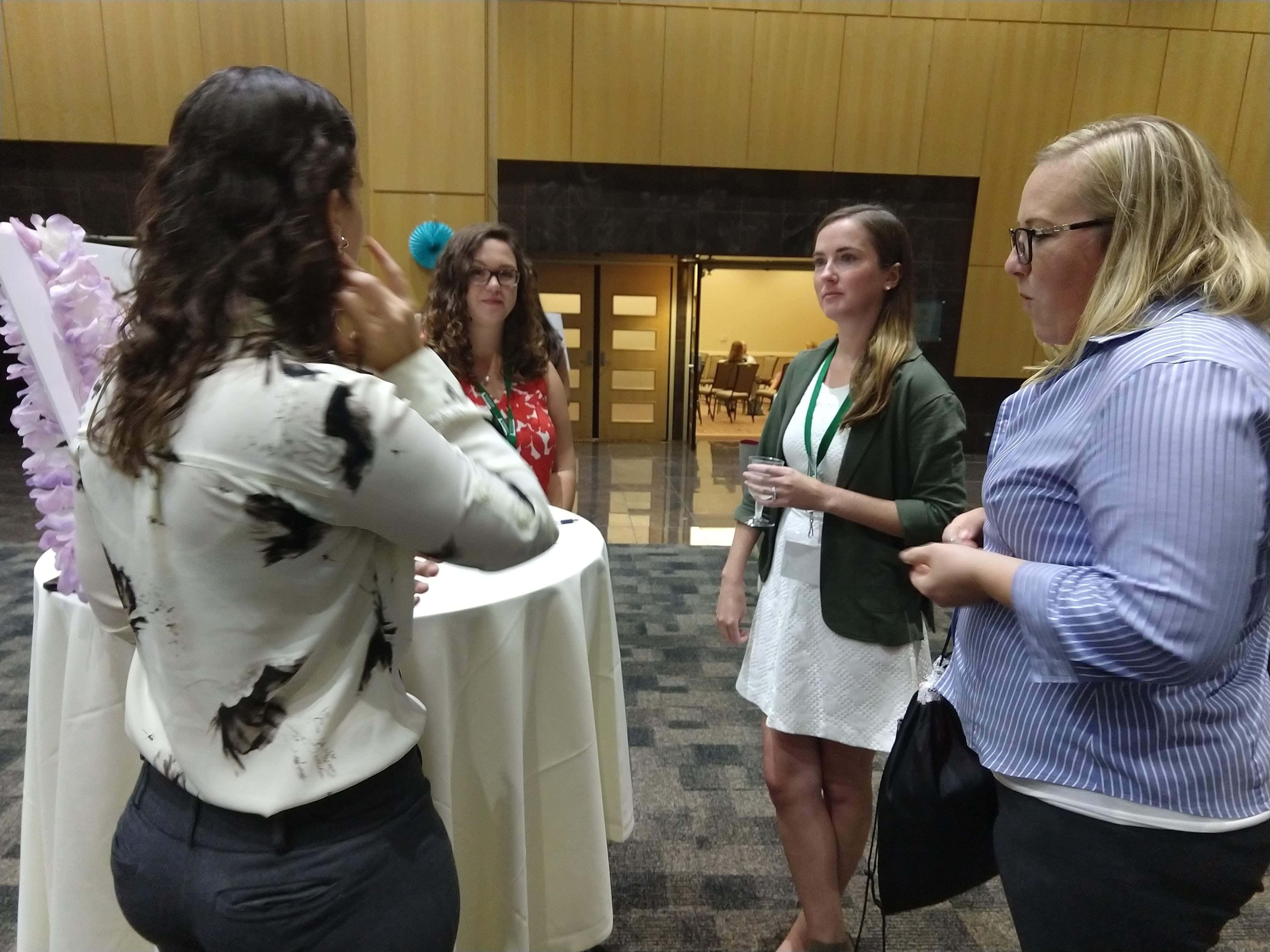 Four women networking.