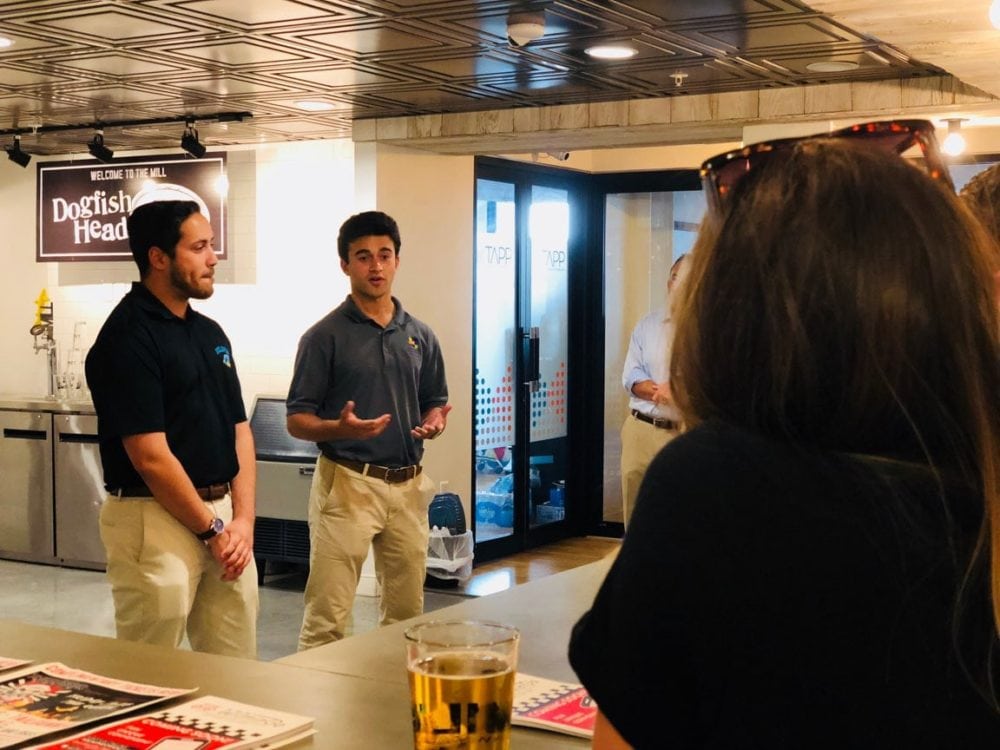 Matt Lombardi and Andrew Cercena present WilminGo at a Happy Hour event at The Mill. (Photo courtesy of Rebecca Parsons)