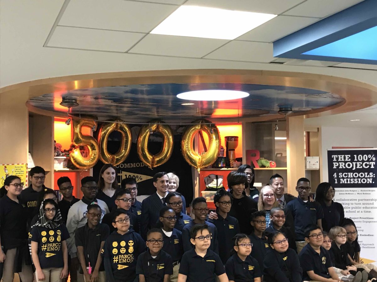 Officials including Mayor Catherine Pugh and JHU President Ronald Daniels joined Commodore Rodgers School students who received glasses through Vision for Baltimore. (Photo by Stephen Babcock)