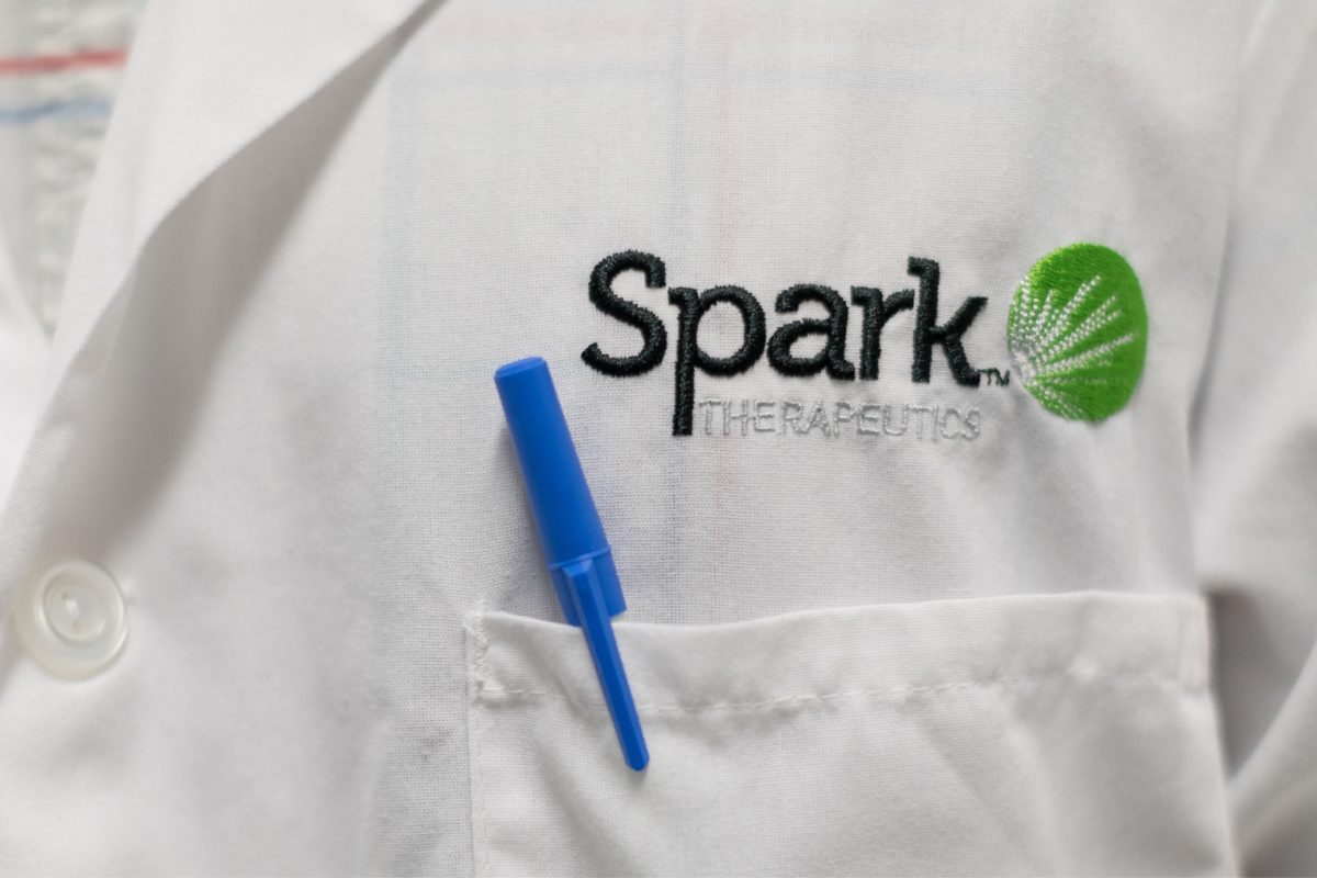 A Spark-branded lab coat