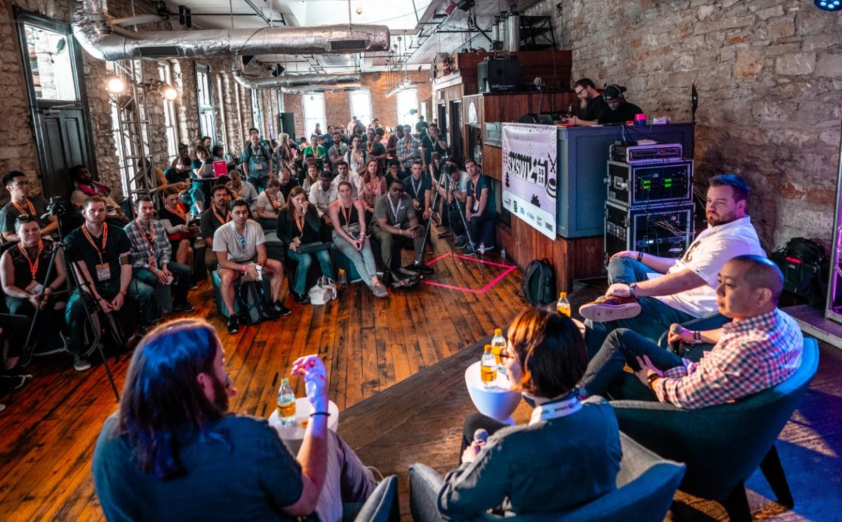 panelists and a crowd