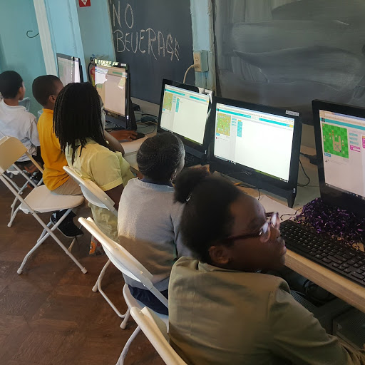 Students coding at St. Francis Neighborhood Center.