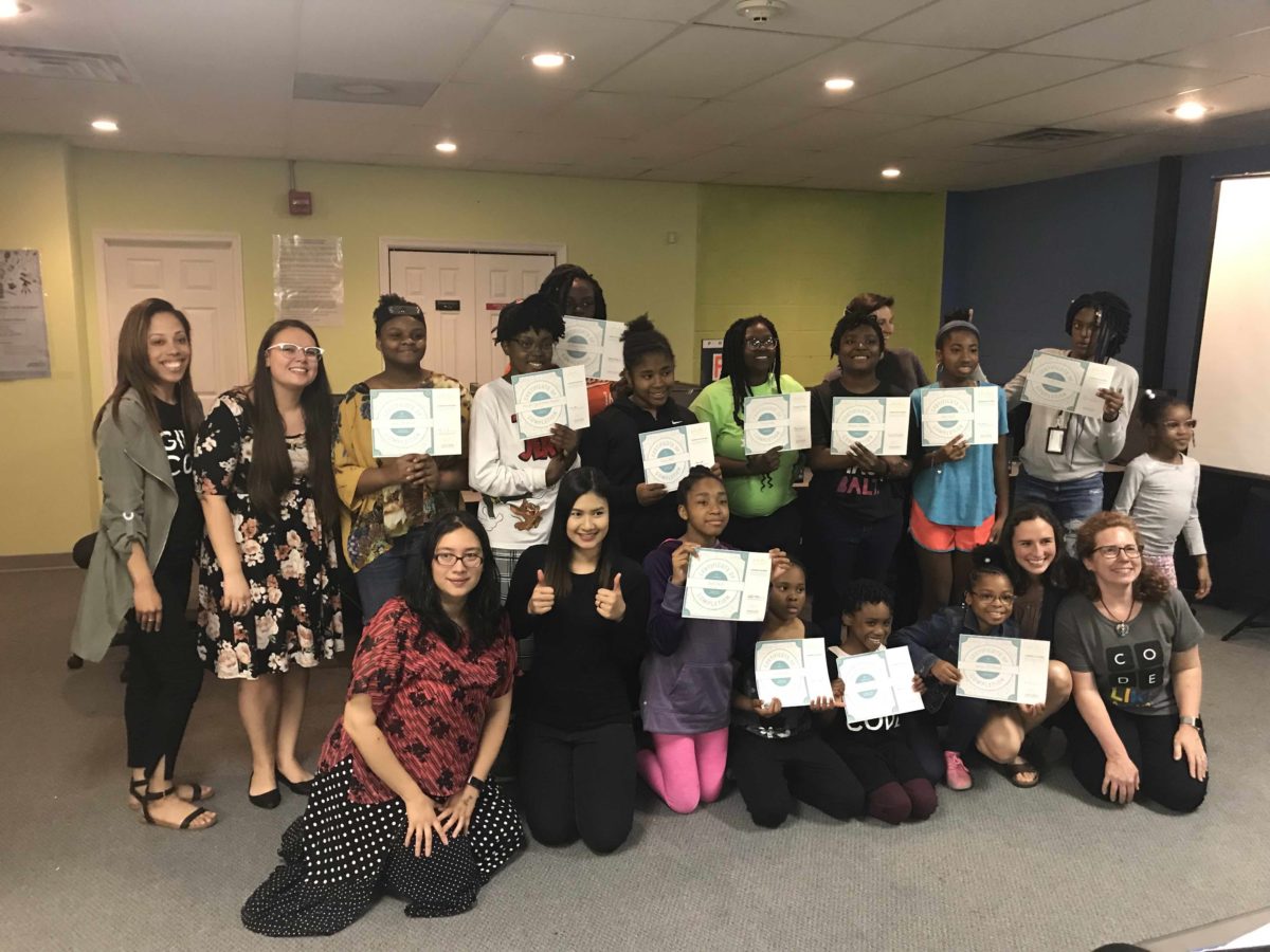 Students and facilitators at Girls Who Code in the Cyber Center.