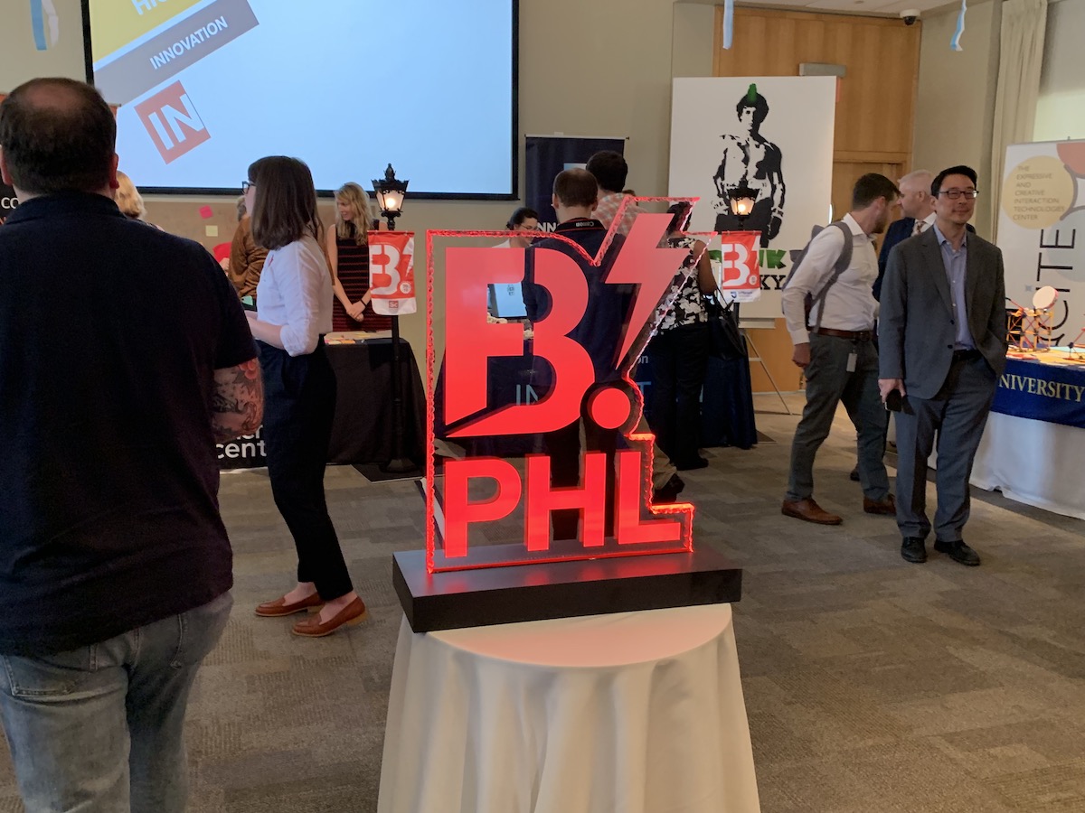The B. PHL logo illuminated at its launch press conference in 2019.