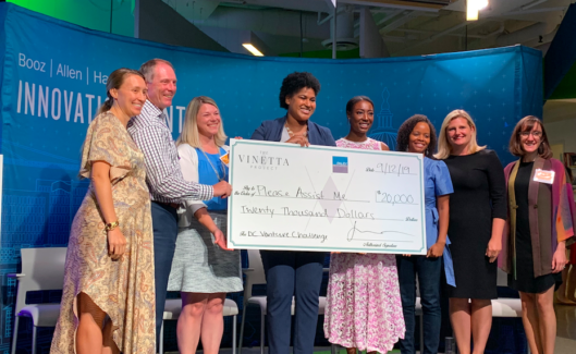 Stephanie Cummings of Please Assist Me accepting her award at the Vinetta Project 2019 Venture Challenge. 