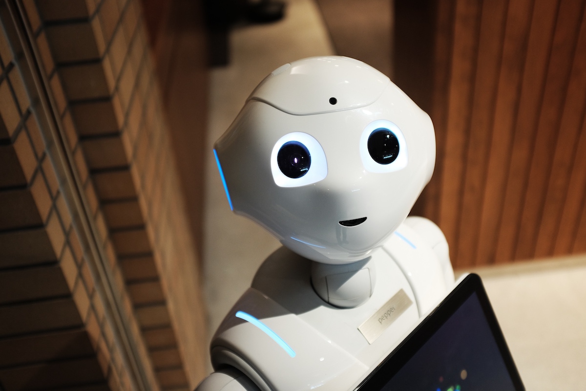 Pepper, the first humanoid robot that uses AI to recognize faces and human emotions, introduced in 2014.
