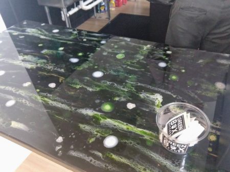 The Green Box Kitchen front counter is a work of art by Rick Hidalgo.