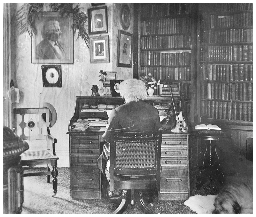 Frederick Douglass in his study at Cedar Hill, located at 1411 W Street SE in 1885.