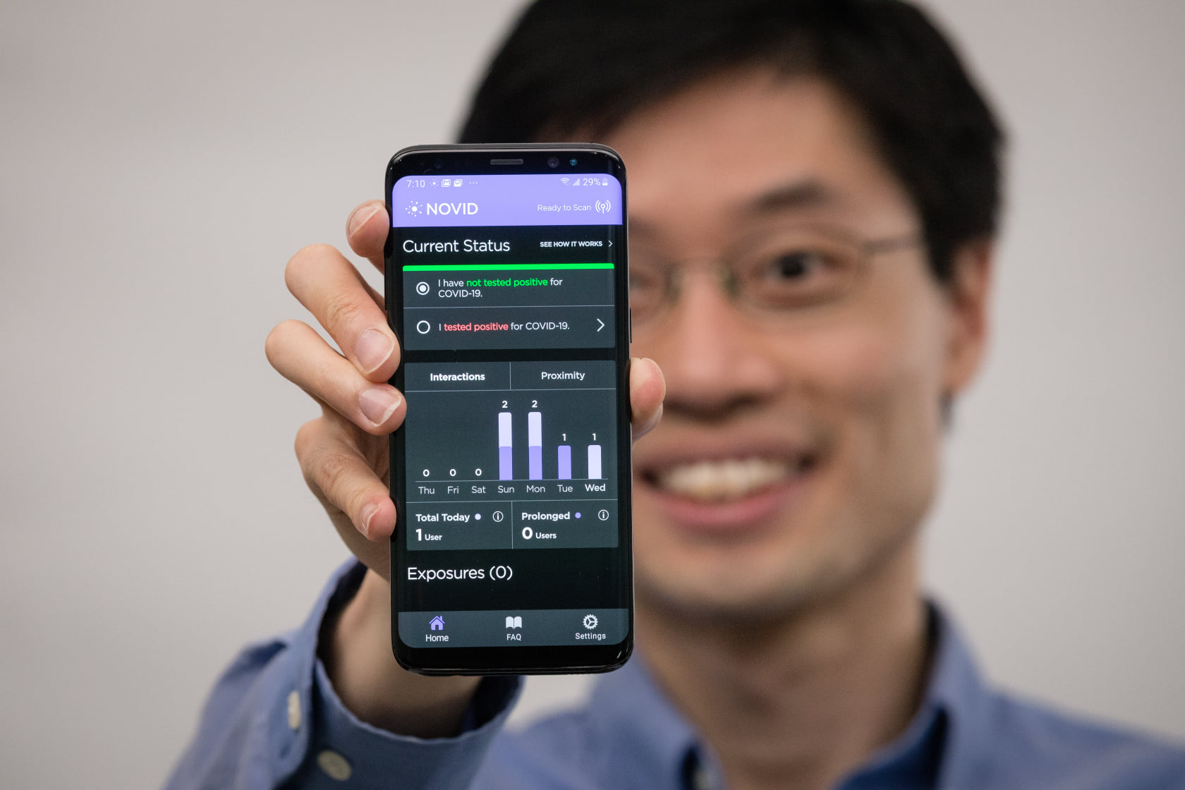 Po-Shen Loh displays NOVID app. (Courtesy photo)