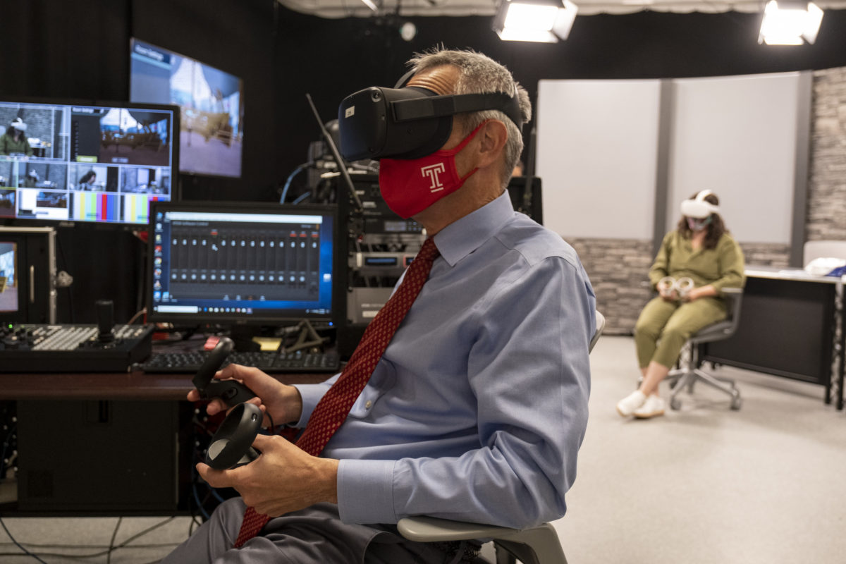 Ronald Anderson, dean of the Fox School of Business at Temple University, using a VR headset.