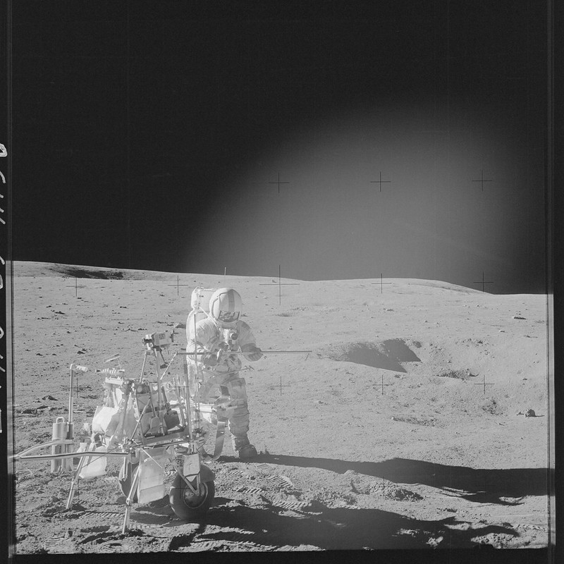 Astronaut Alan Shepard shows his golf club on the Moon. (via Apollo 14 archive/Public Domain)