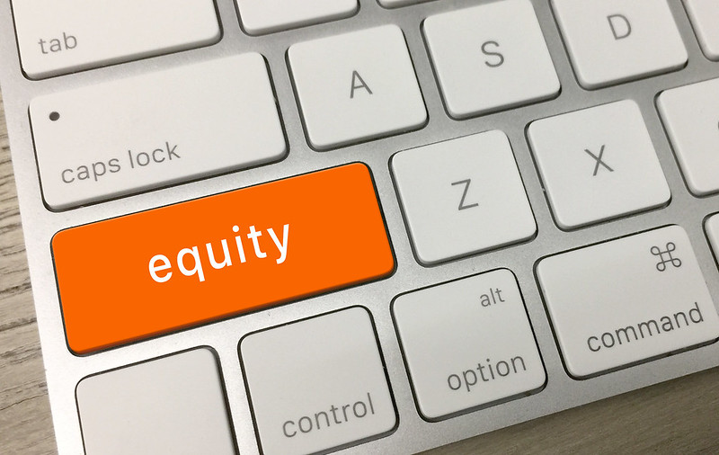 An image of the word “equity” on an otherwise standard keyboard.