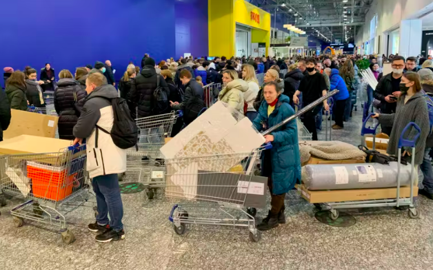 Muscovites rushed to buy furniture and other goods from IKEA before it closed its Russian stores.