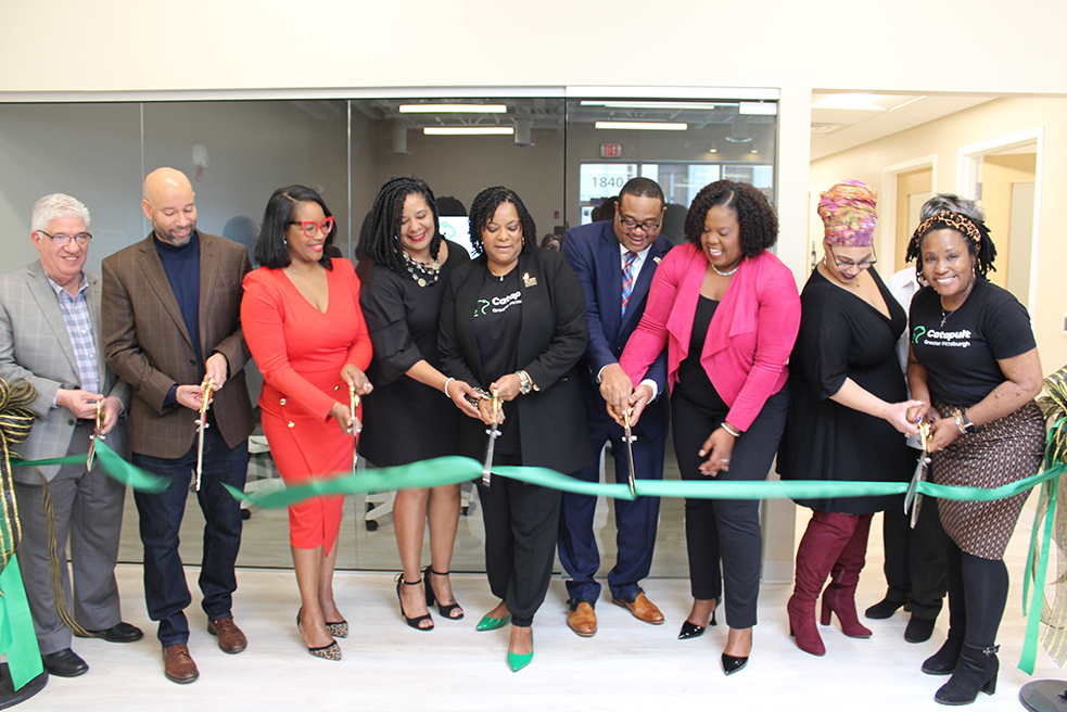 Mayor Ed Gainey and other local officials and community representatives cut the ribbon for the new Gallery on Centre.