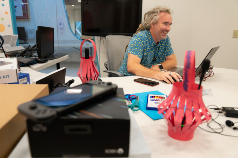 Gamer Scott Shaw at his desk at Nemours