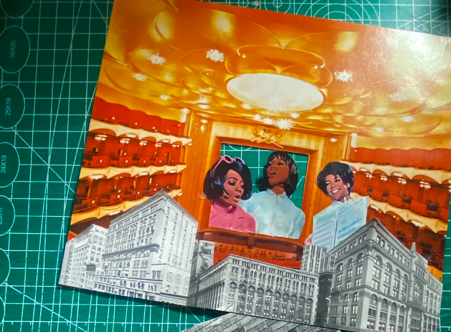 A collage by Doriana Diaz features members of The Supremes against a red, orange, and yellow background.