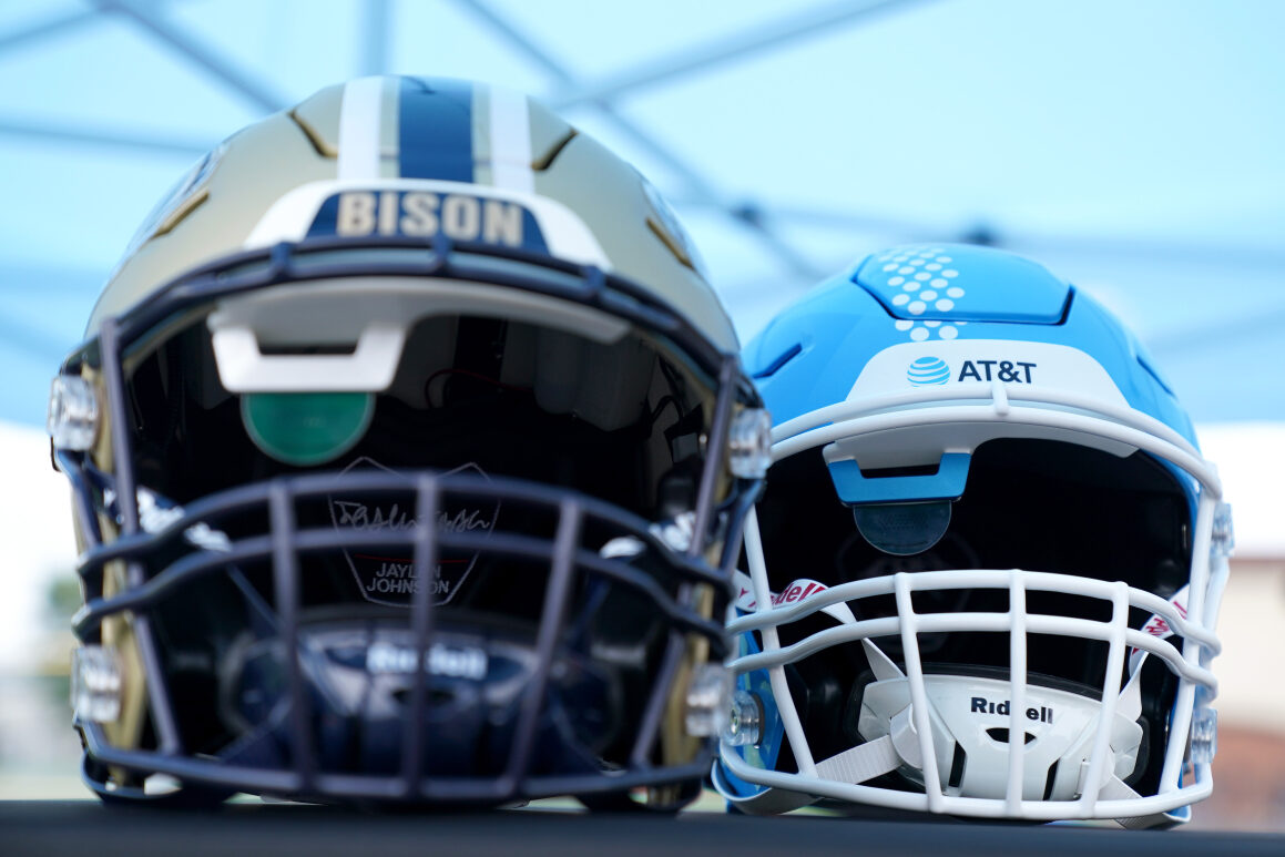 Two helmets side by side.